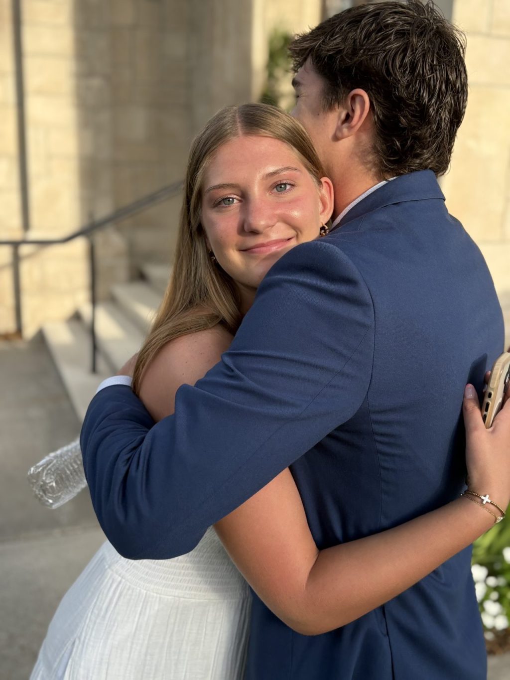 picture of author's son and daughter giving each other a heart to heart hug