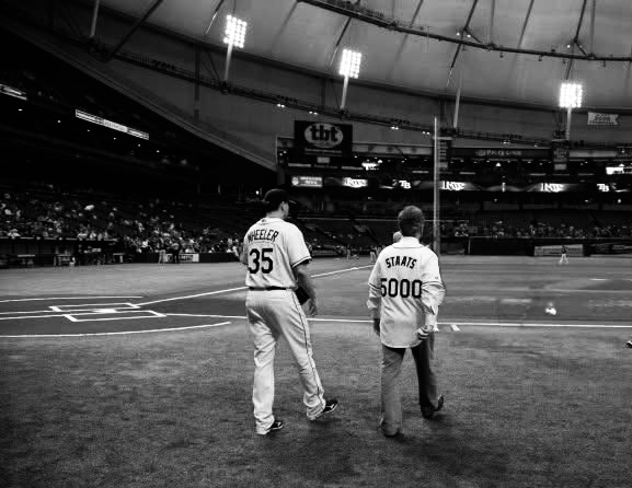 Dan Wheeler and Dewayne Staats walking at Tropicana Field